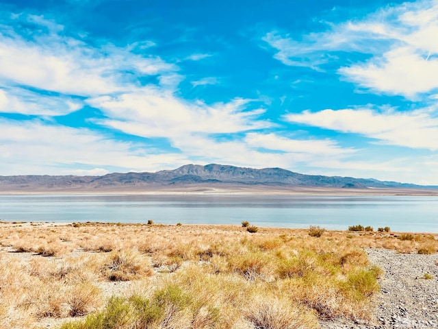 property view of water featuring a mountain view