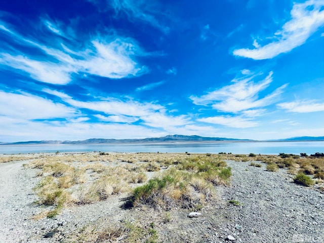 property view of water featuring a mountain view