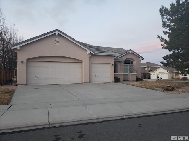 ranch-style house with a garage