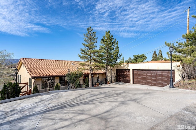 view of front of property featuring a garage