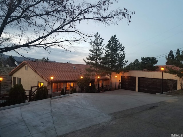 view of front of home with a garage