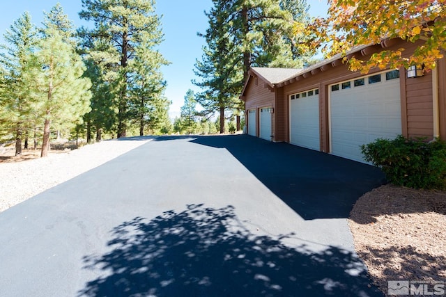 exterior space featuring a garage