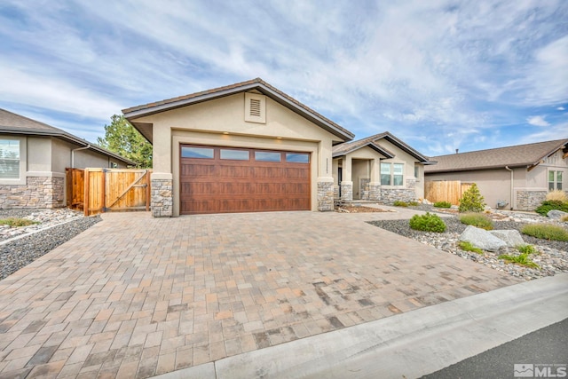 view of front of home with a garage