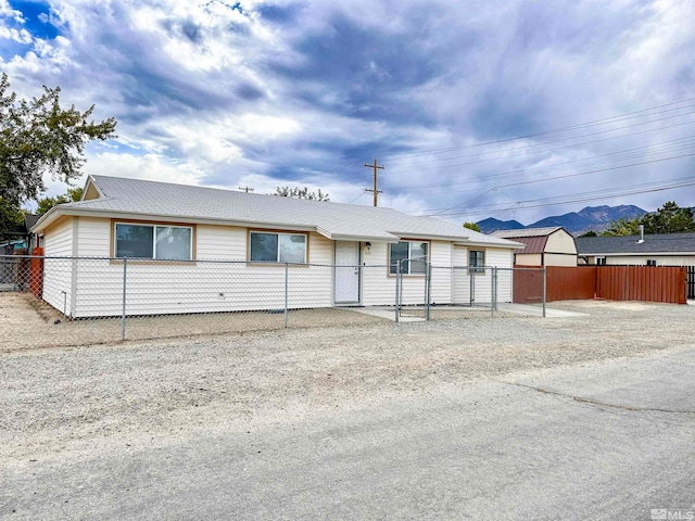 ranch-style house with a mountain view