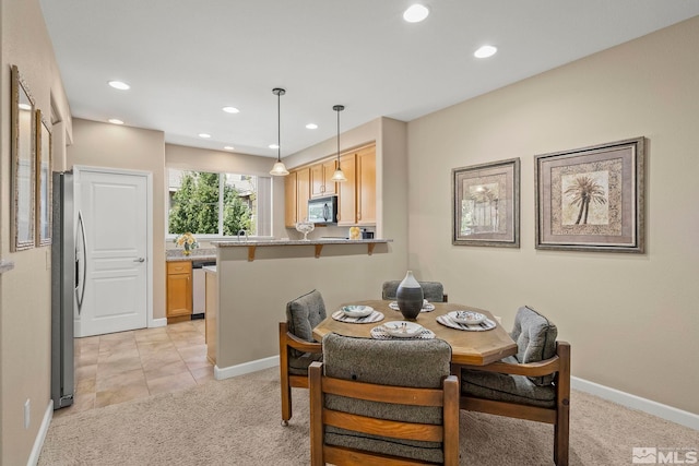 view of carpeted dining room