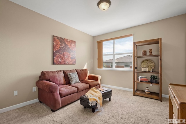 living room with lofted ceiling and carpet