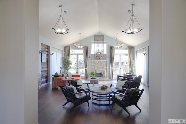 dining area featuring a fireplace, hardwood / wood-style floors, and a wealth of natural light