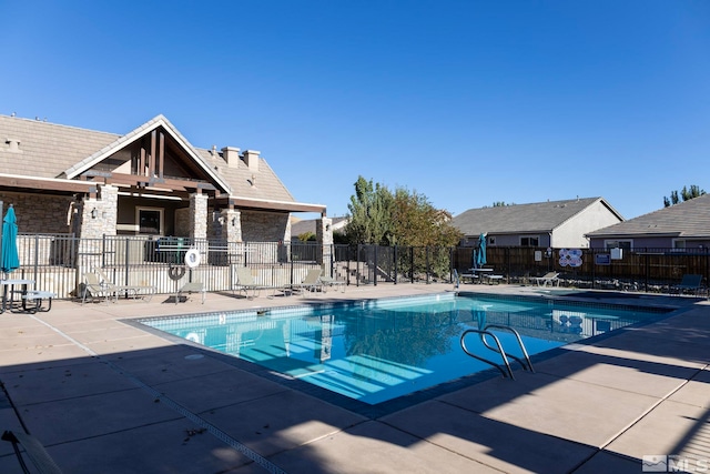 view of pool with a patio