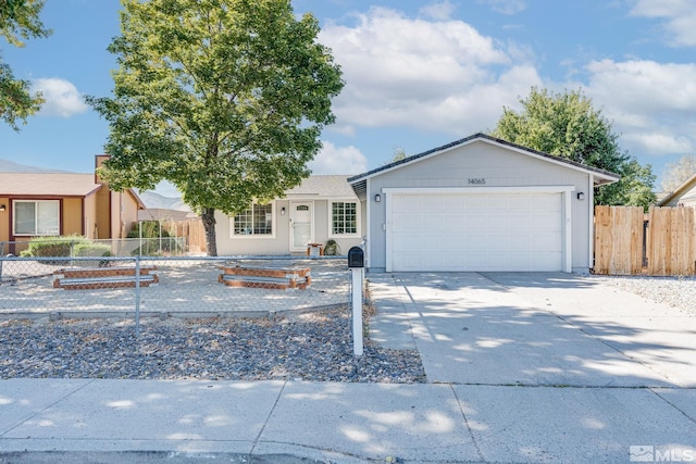 single story home with a garage