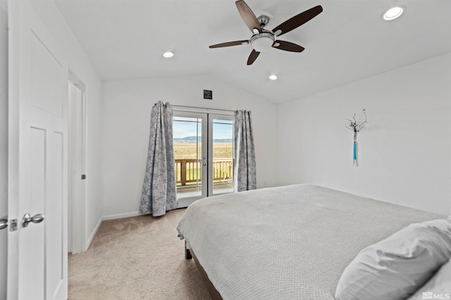 carpeted bedroom featuring access to exterior, vaulted ceiling, and ceiling fan