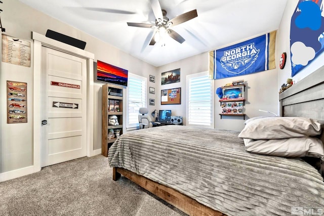 carpeted bedroom with ceiling fan