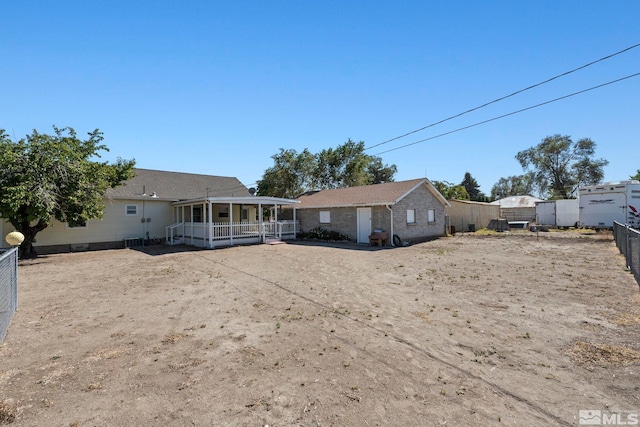 back of property featuring a patio