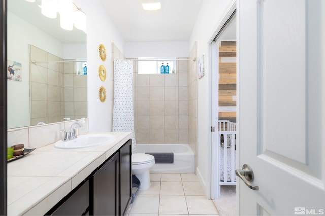 full bathroom featuring shower / tub combo, tile patterned floors, vanity, and toilet