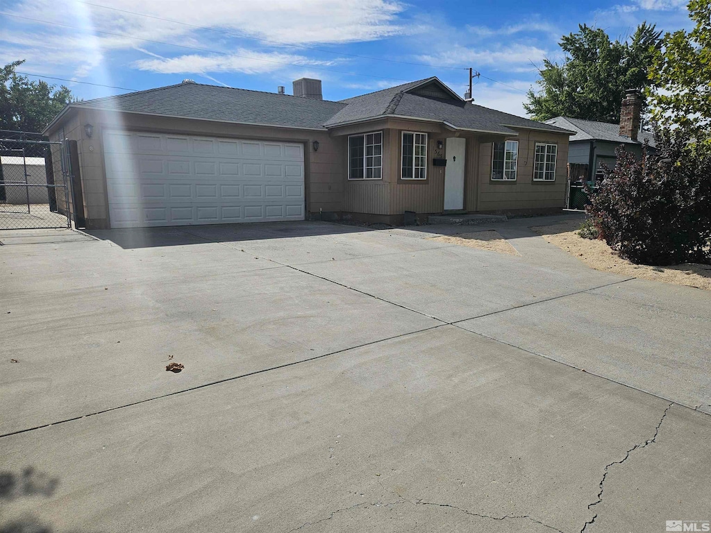 single story home featuring a garage