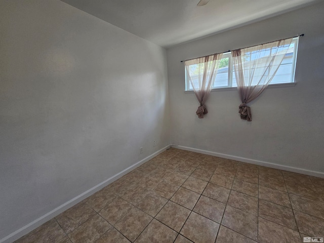 view of tiled spare room