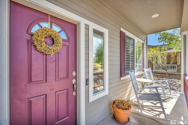 entrance to property with a porch