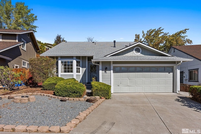 single story home featuring a garage