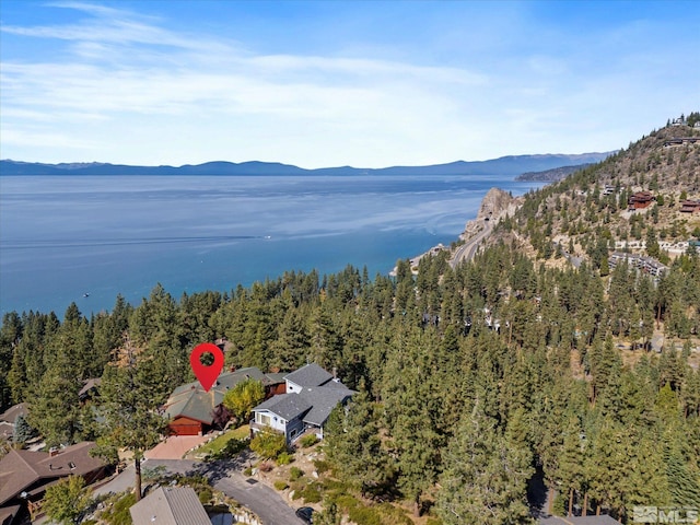 bird's eye view with a water and mountain view