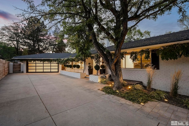 view of front of property featuring a garage