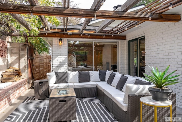 view of patio featuring outdoor lounge area and a pergola