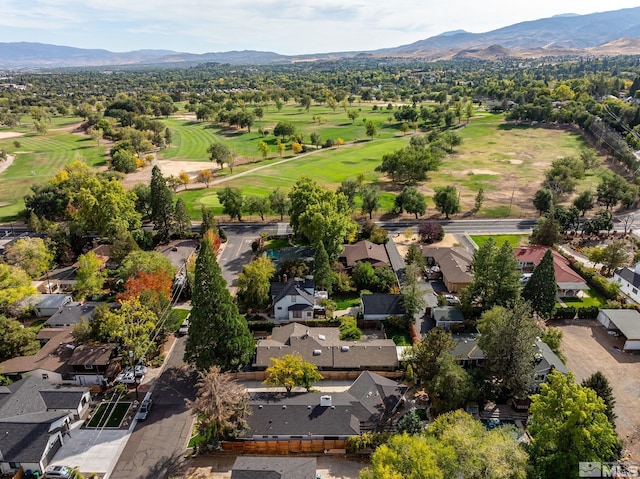 birds eye view of property featuring a mountain view