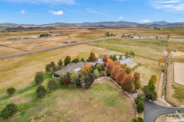 bird's eye view featuring a rural view and a mountain view