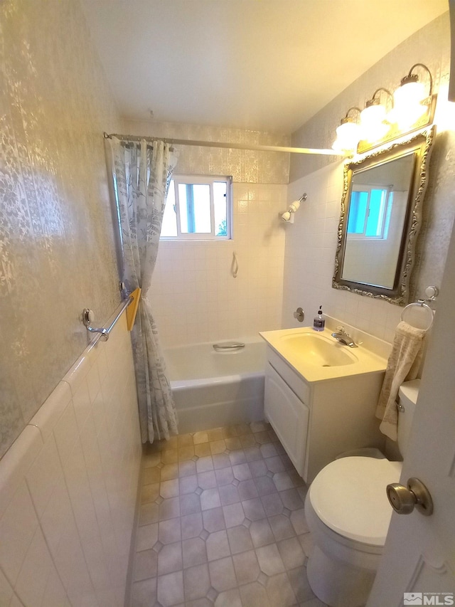 full bathroom with shower / bath combination with curtain, toilet, tile patterned flooring, and vanity