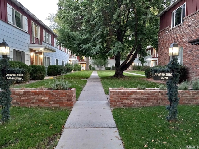 surrounding community with a yard