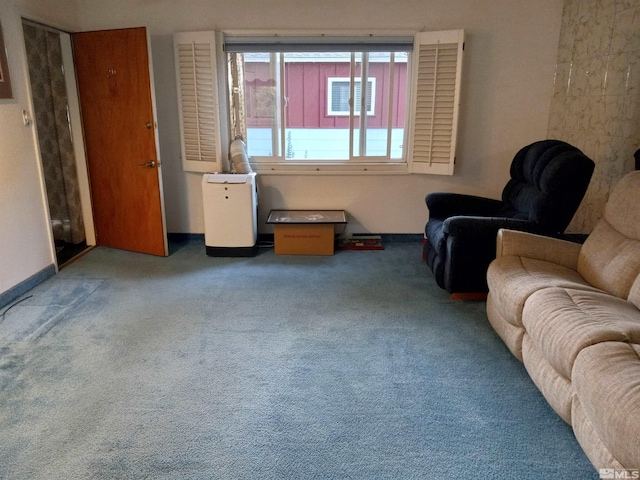 sitting room with carpet flooring