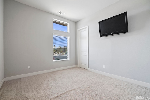 view of carpeted spare room