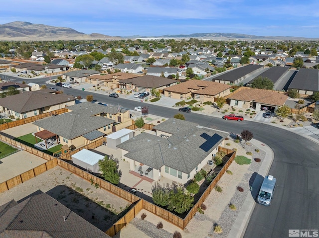 drone / aerial view featuring a mountain view