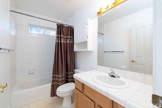 bathroom featuring shower / tub combo, toilet, and vanity