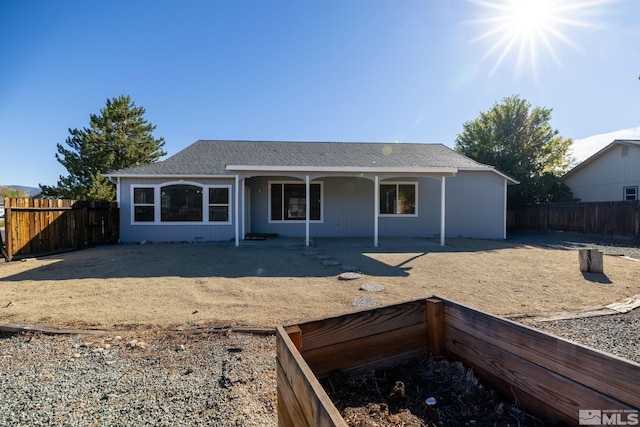 view of front of property with a patio