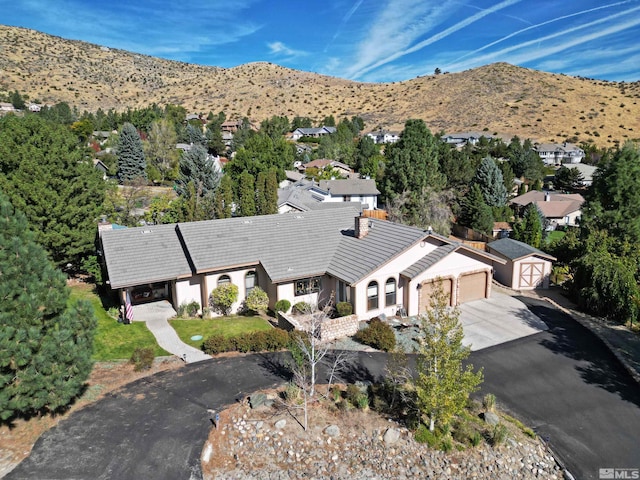 drone / aerial view featuring a mountain view