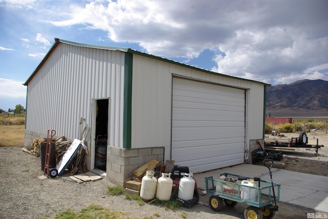 garage featuring a mountain view