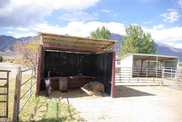 view of outdoor structure featuring a mountain view