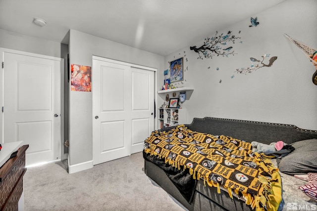 carpeted bedroom featuring a closet