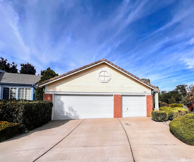 view of front of home with a garage