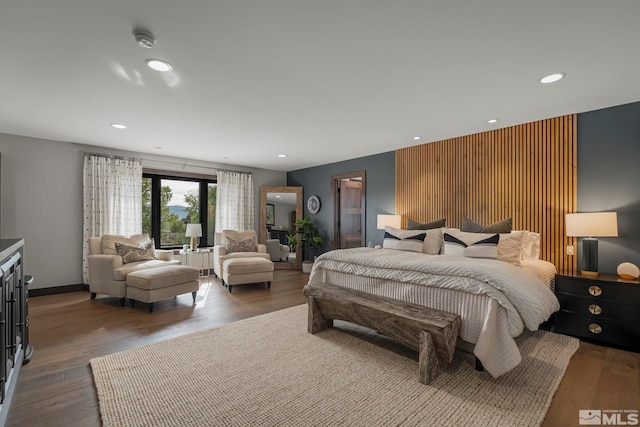 bedroom featuring hardwood / wood-style floors