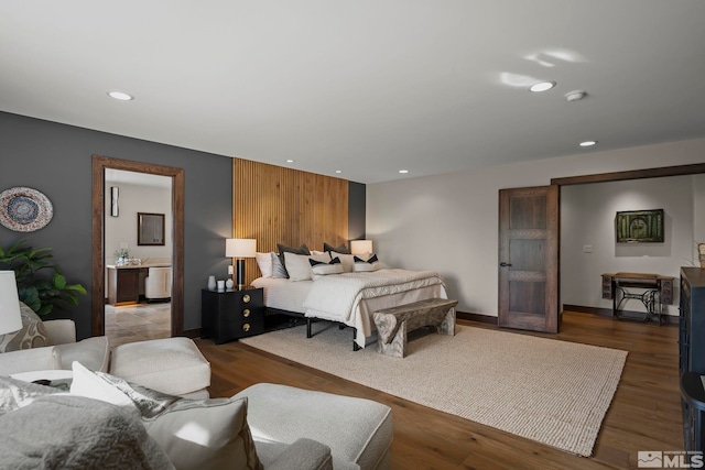 bedroom featuring dark hardwood / wood-style flooring