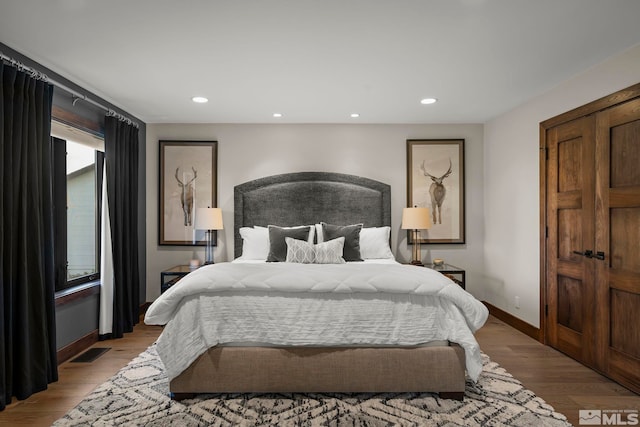 bedroom featuring light wood-type flooring