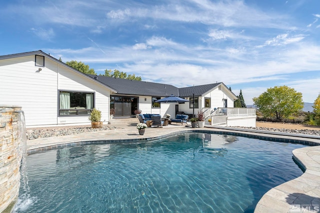 view of pool featuring a patio area