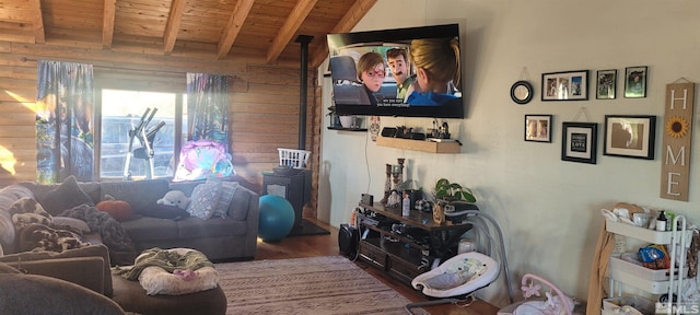 living room featuring hardwood / wood-style floors, beam ceiling, and wooden ceiling