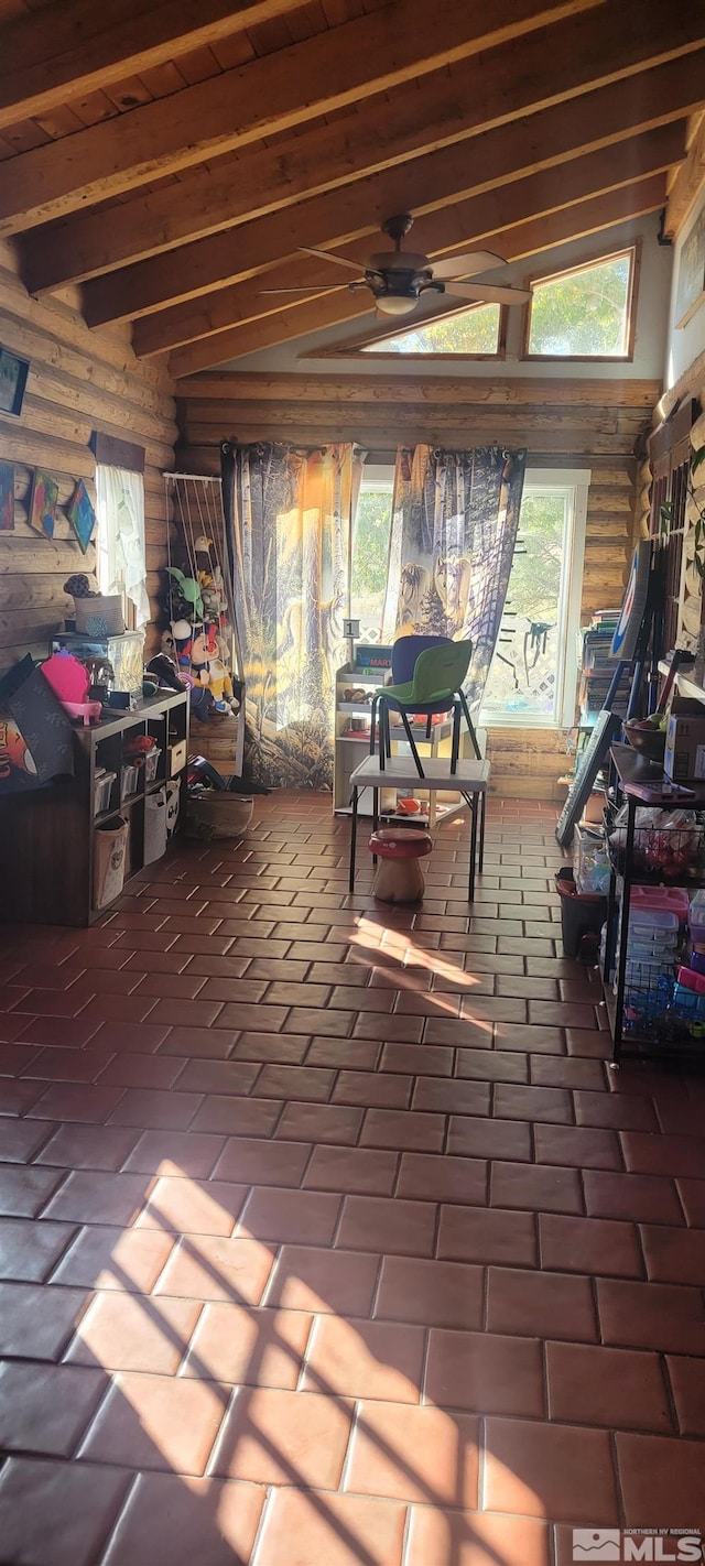 playroom featuring lofted ceiling with beams and ceiling fan