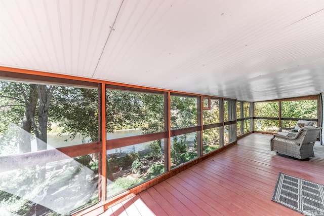 unfurnished sunroom featuring a wealth of natural light