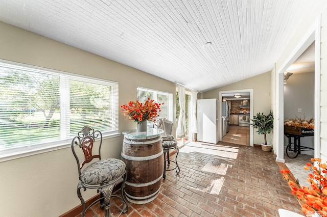 sunroom with vaulted ceiling