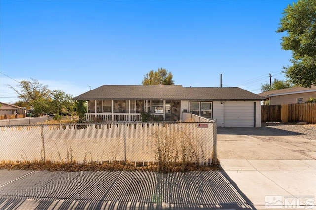 single story home featuring a garage