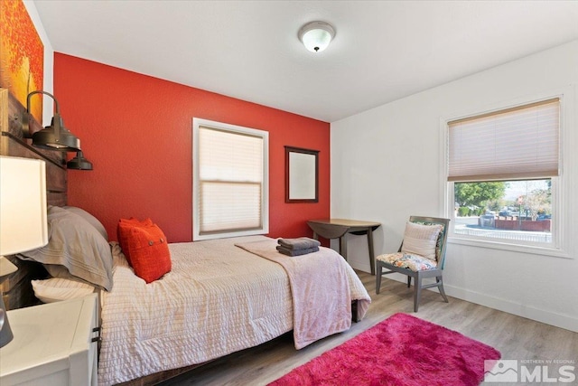 bedroom featuring light hardwood / wood-style flooring