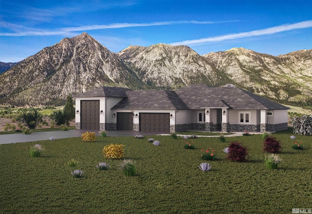 view of front of house with a front yard, a mountain view, and a garage