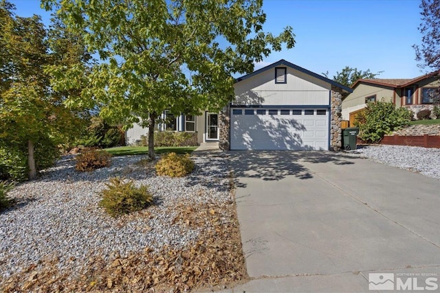 ranch-style house featuring a garage